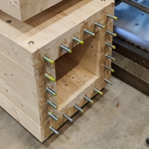 Moment-Resisting Column-Base Connections in Glued Laminated Timber Using Glued-in Rods